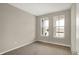 Cozy bedroom with carpet floors and double windows providing ample natural light at 413 Onset Way, Westfield, IN 46074