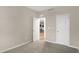 Comfortable bedroom featuring neutral carpet and two large white doors at 413 Onset Way, Westfield, IN 46074