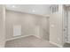 Hallway featuring neutral walls, carpeted flooring and a small storage area at 413 Onset Way, Westfield, IN 46074