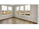 Sun-filled room with large windows, views of pond and neighborhood, and hardwood floors at 413 Onset Way, Westfield, IN 46074