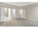 Spacious main bedroom with ensuite bathroom, walk-in closet, and neutral carpeting at 413 Onset Way, Westfield, IN 46074