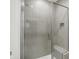 Modern glass shower with built-in niche and bench seating at 413 Onset Way, Westfield, IN 46074