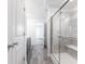 Bathroom with grey tile floor and a glass shower at 1116 Bevy Blvd, Danville, IN 46122