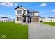 Two-story house with a brown door and attached garage at 1116 Bevy Blvd, Danville, IN 46122