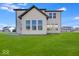 Two story house with large sunroom and green lawn at 1116 Bevy Blvd, Danville, IN 46122