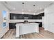 Modern kitchen with dark cabinets and an island at 1116 Bevy Blvd, Danville, IN 46122
