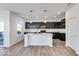 Modern kitchen with dark cabinets and an island at 1116 Bevy Blvd, Danville, IN 46122