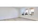 Spacious living room with hardwood floors and large windows at 1116 Bevy Blvd, Danville, IN 46122