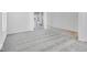 Spacious living room featuring hardwood and carpeted floors at 1116 Bevy Blvd, Danville, IN 46122