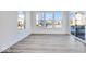 Bright sunroom with hardwood floors and sliding doors at 1116 Bevy Blvd, Danville, IN 46122