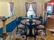 Inviting dining room with elegant table, decorative mirror, and blue accent wall for a touch of color at 3305 N Keystone Ave, Indianapolis, IN 46218