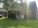 Charming brick home with awnings and a cozy front porch, perfect for relaxing in the neighborhood at 3305 N Keystone Ave, Indianapolis, IN 46218