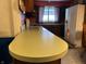 Bright kitchen featuring a gas range stove, sleek countertops and stainless steel refrigerator at 3305 N Keystone Ave, Indianapolis, IN 46218