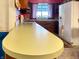 Bright kitchen with a large, light-colored countertop, white appliances, and window for natural light at 3305 N Keystone Ave, Indianapolis, IN 46218