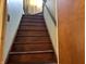 A wood staircase leading to the upper level at 3305 N Keystone Ave, Indianapolis, IN 46218