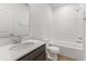 Clean bathroom with a white tub/shower combo, toilet and vanity at 5759 Cr W 750 N, McCordsville, IN 46055