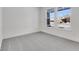 Bright bedroom featuring a large window with a view and gray carpeting at 5759 Cr W 750 N, McCordsville, IN 46055