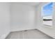 Spacious bedroom with grey carpet and a window view at 5759 Cr W 750 N, McCordsville, IN 46055