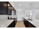 Modern kitchen with dark cabinetry, quartz countertops and island at 5759 Cr W 750 N, McCordsville, IN 46055
