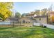 Two-story house with deck, fenced yard, and grill at 7709 Elk Dr, Nineveh, IN 46164