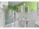 Clean bathroom with a shower/tub combo and pedestal sink at 7709 Elk Dr, Nineveh, IN 46164