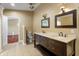 Elegant bathroom with double vanity, large mirror, and separate shower at 7709 Elk Dr, Nineveh, IN 46164