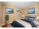 Cozy bedroom featuring a plush bed, neutral tones, and scenic artwork at 7709 Elk Dr, Nineveh, IN 46164