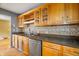 Kitchen with light wood cabinets, granite counters, and stainless steel appliances at 7709 Elk Dr, Nineveh, IN 46164