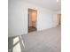 Spacious bedroom featuring neutral carpet, white walls, and ensuite bath access at 1217 Fleming Dr, Greenfield, IN 46140