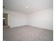 Neutral bedroom with carpet, white walls, and a view of the entry door at 1217 Fleming Dr, Greenfield, IN 46140