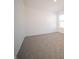 Neutral bedroom with carpet and white walls and a view of the window at 1217 Fleming Dr, Greenfield, IN 46140