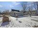 House backyard with snow-covered ground at 405 E 9Th St, Sheridan, IN 46069