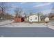 Cozy backyard with shed and snowy ground at 405 E 9Th St, Sheridan, IN 46069