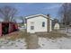 Cozy backyard with shed and snowy ground at 405 E 9Th St, Sheridan, IN 46069