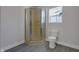 Clean bathroom with a new shower and toilet at 405 E 9Th St, Sheridan, IN 46069