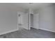 Bright bedroom with two closets and access to hallway at 405 E 9Th St, Sheridan, IN 46069