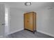 Bedroom with wood cabinet and access to hallway at 405 E 9Th St, Sheridan, IN 46069