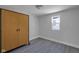 Empty bedroom with wood cabinet and window at 405 E 9Th St, Sheridan, IN 46069