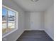Spacious entryway with gray walls, dark floors and natural light at 405 E 9Th St, Sheridan, IN 46069