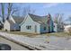 Rear view of renovated blue house, highlighting its charming design at 405 E 9Th St, Sheridan, IN 46069