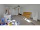Unfinished garage with tools and paint at 405 E 9Th St, Sheridan, IN 46069