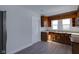 Cozy kitchen with wood cabinets and a neutral color scheme at 405 E 9Th St, Sheridan, IN 46069