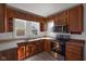 Bright kitchen with updated cabinetry and stainless steel appliances at 405 E 9Th St, Sheridan, IN 46069