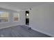 Sunroom with kitchen access and backyard view at 405 E 9Th St, Sheridan, IN 46069