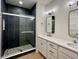 Contemporary bathroom with a glass-enclosed shower, double vanity, and modern fixtures at 460 W Smoky Row, Carmel, IN 46032