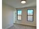 Bright bedroom with large windows and neutral carpeting at 460 W Smoky Row, Carmel, IN 46032
