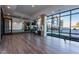 Modern fitness center with wood floors, mirrors, and equipment at 460 W Smoky Row, Carmel, IN 46032
