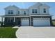 Attractive two-story home featuring a two-car garage, dark brick and light siding at 236 Sam Himsel Way, Danville, IN 46122