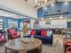 Open-concept living room with high ceilings, modern furnishings, and bright, airy atmosphere at 236 Sam Himsel Way, Danville, IN 46122