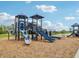 Fun community playground with slides, climbing structures, and soft ground cover at 236 Sam Himsel Way, Danville, IN 46122